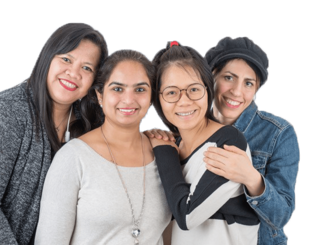 Four women together smiling