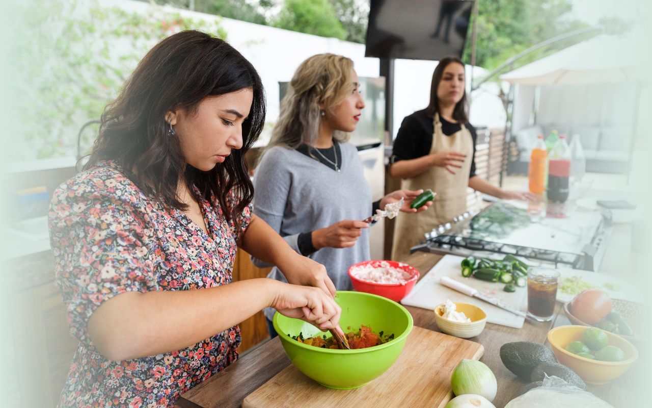 Women learning and teaching how to cook